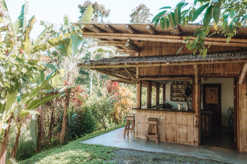Bamboo kitchen building among food gardens at Finca Tierra